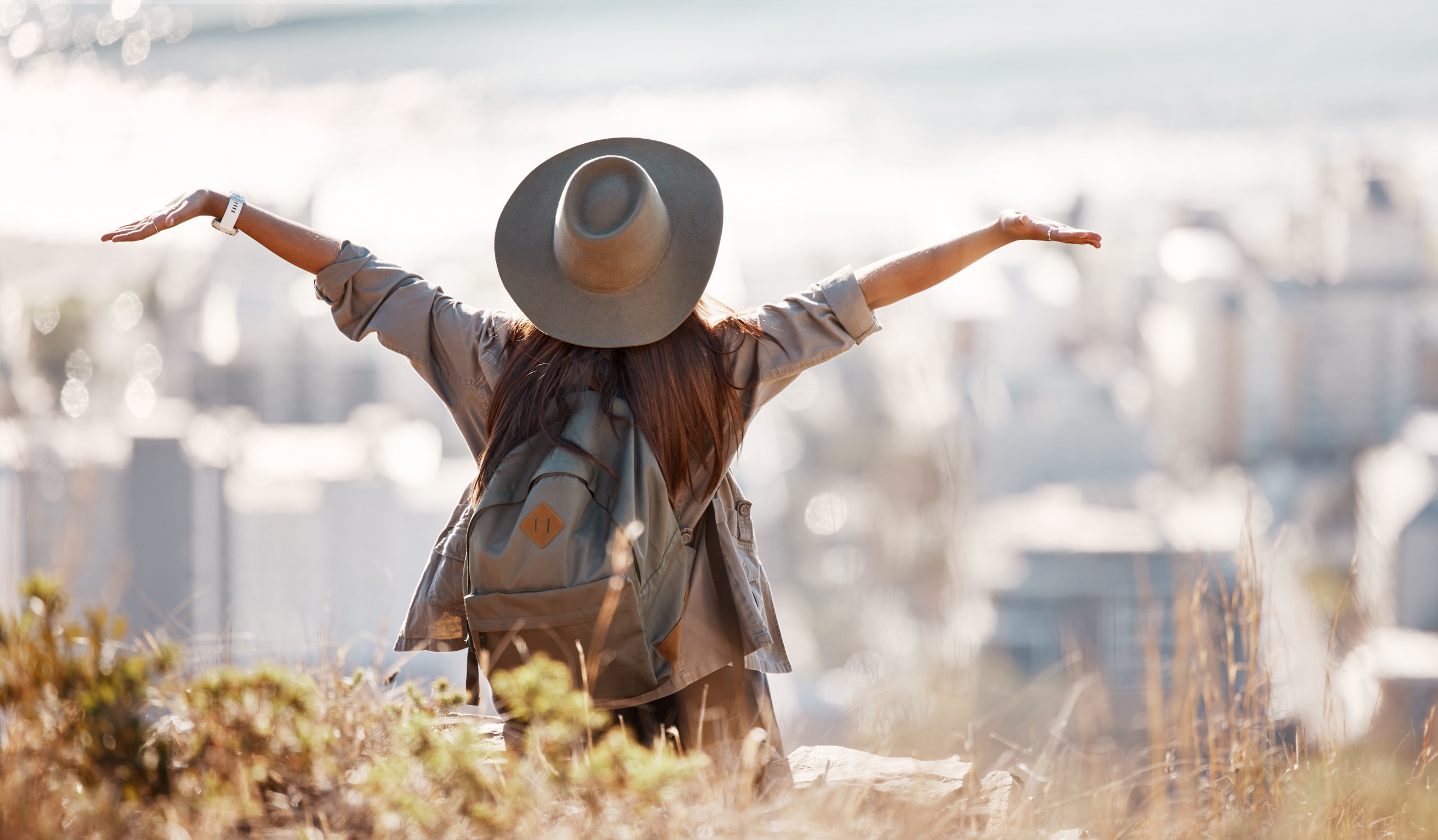 Woman Tourist Hiking Travel Freedom City Adventure Backpacking Journey Mountain Nature Female Hiker With Open Arms Enjoying Fresh Air Trekking Scenery Urban Town