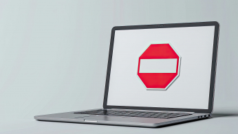 Laptop Notebook Computer With Red Stop Sign